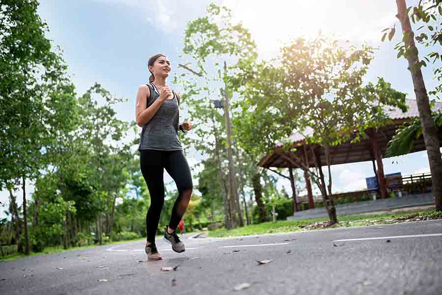 A woman running to Ankle Injury Recovery